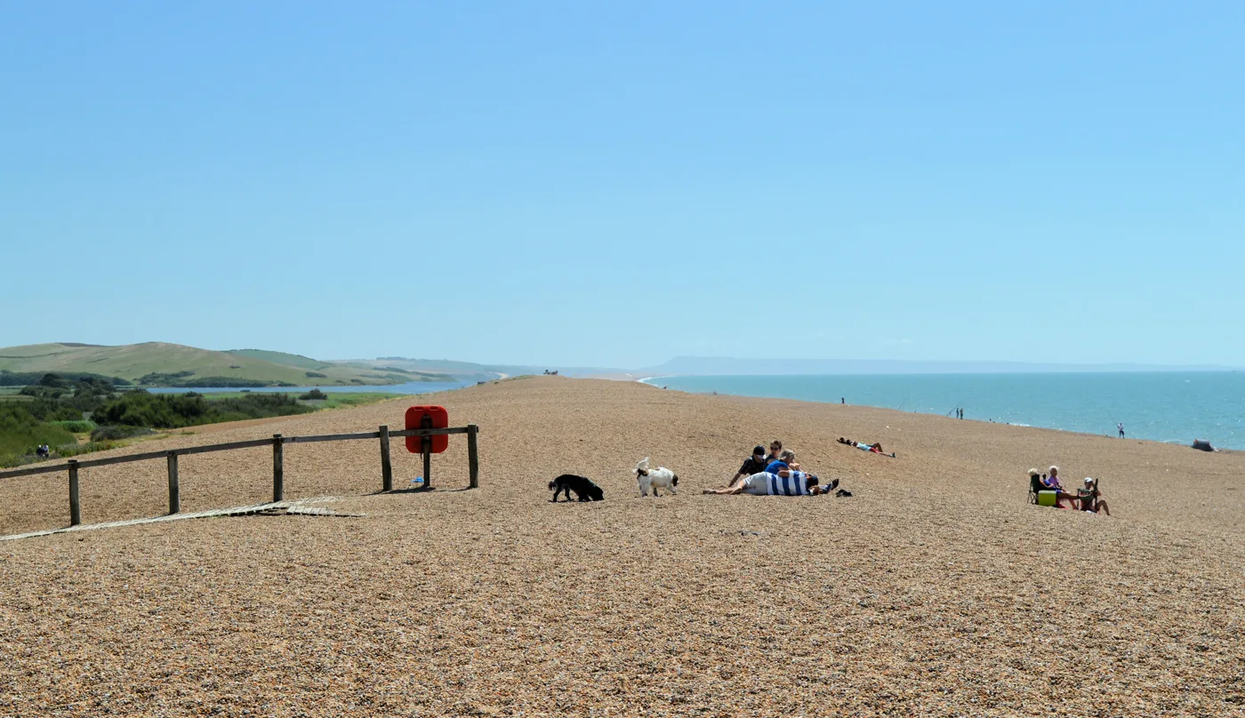 Chesil Beach at Abbotsbury, looking along the shingle towards Portland, with the Fleet behind the bank on the left